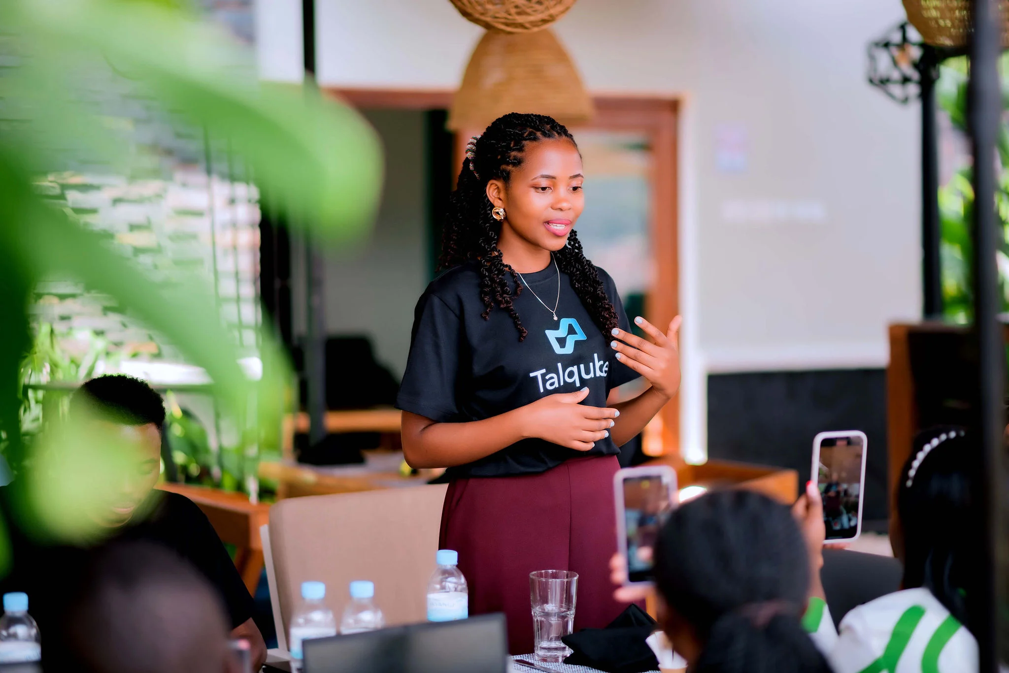 A Talqube team member presenting to young people at a workforce event